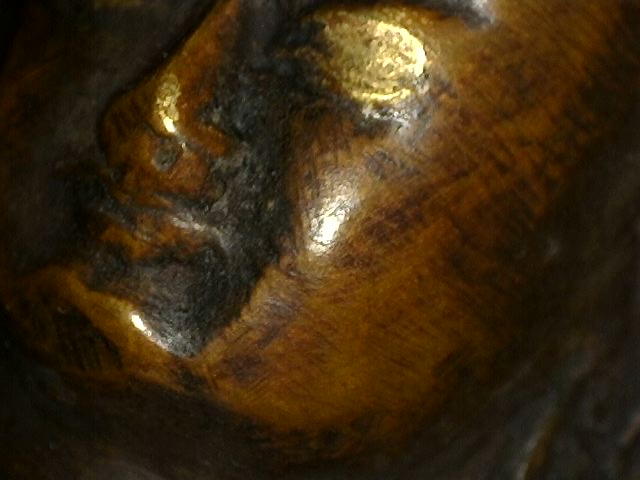 Microscoopbeeld van authentieke patina op Himalaya bronzen Boeddha met dhyana mudra