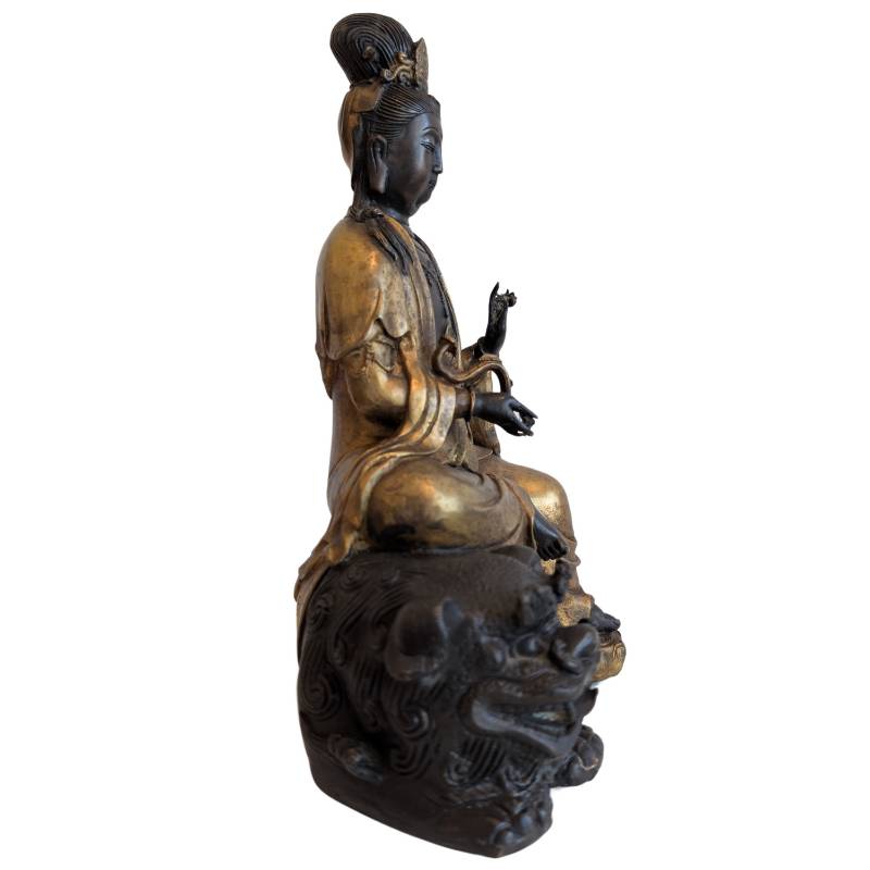 Boeddhistische Guanyin met leeuw van brons