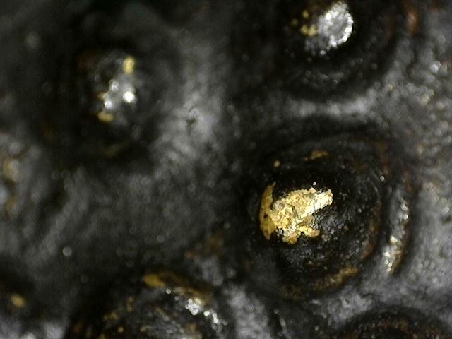 Bronzen Boeddha hoofd met oude goudresten