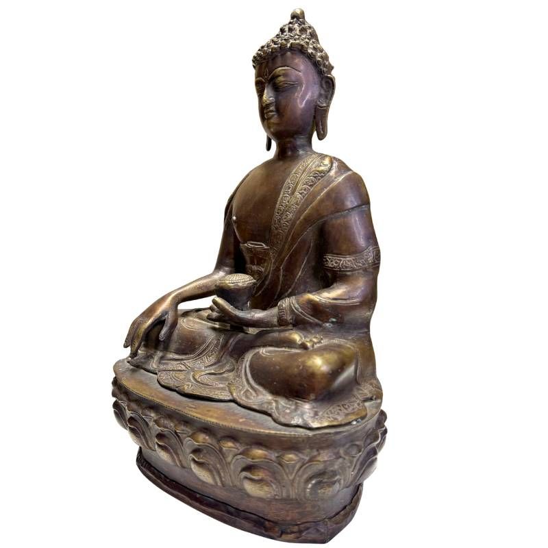 Zijprofiel van antiek bronzen Medicijnboeddha uit de Himalaya traditie