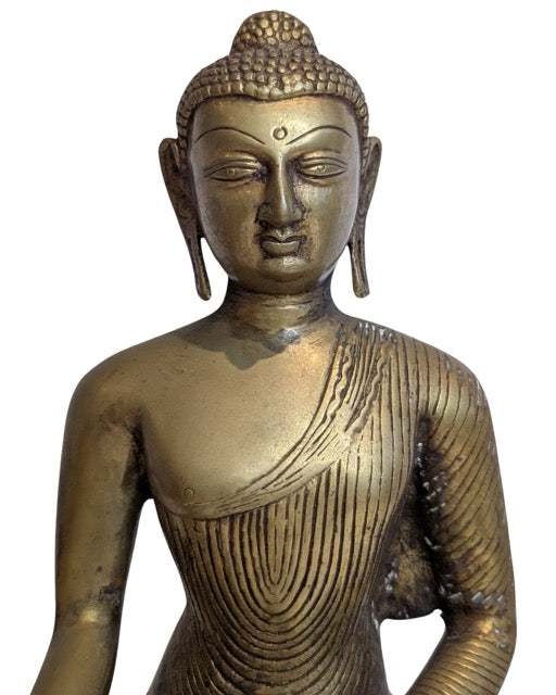 Bronzen Shakyamuni Boeddha met olifantenbasis in aardaanraking mudra