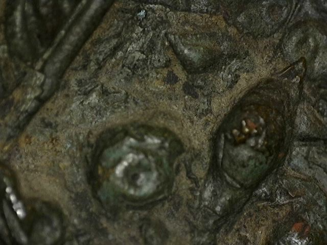 Microscoopdetail van natuurlijke veroudering op Thaise bronzen figuur