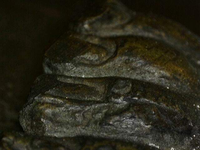 Microscoopdetail van natuurlijke corrosie op Thaise bronzen sculptuur