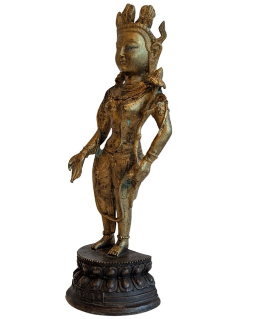 Tibetaans Avalokiteshvara beeld als voorbeeld van boeddhistische kunst