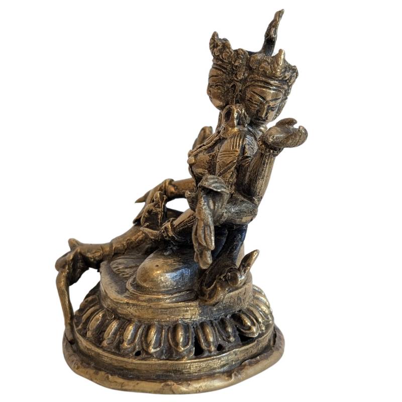 Bronzen Ushnishavijaya met meerdere armen en serene houding