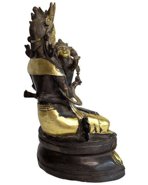 Bronzen Yab Yum beeld met resten van vergulding uit Tibet